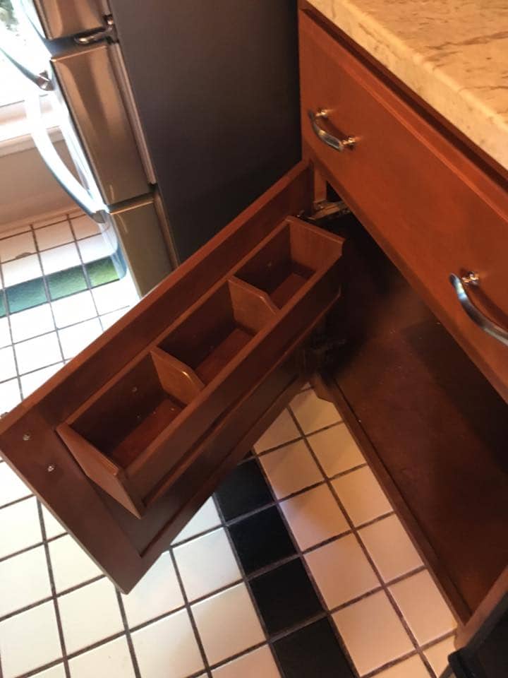 Custom pull-out compartment drawer in Corpus Christi kitchen