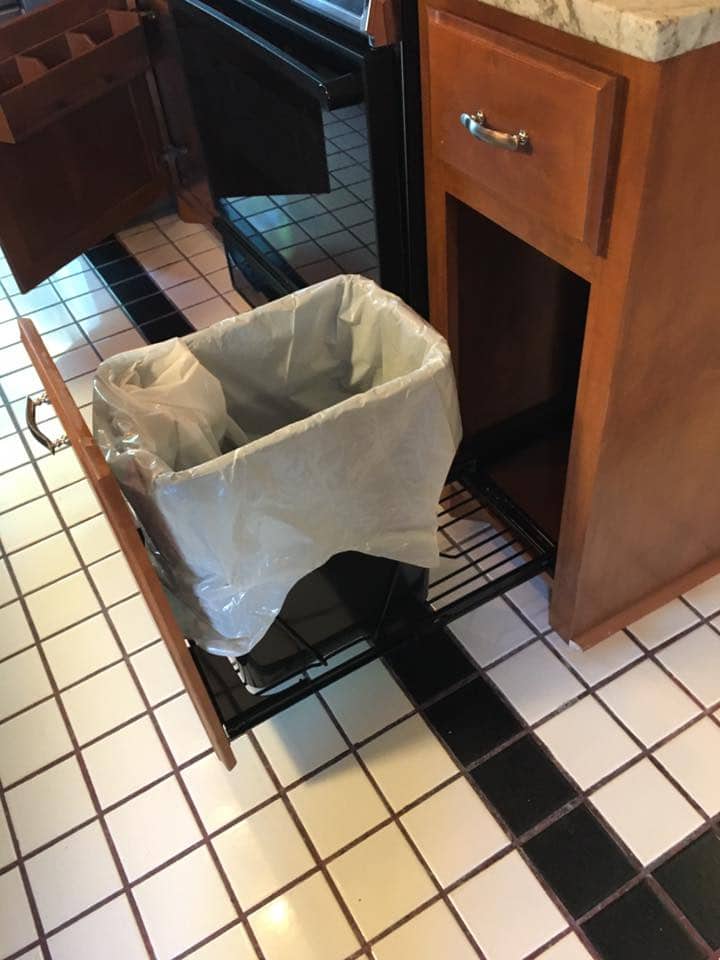 Custom pull-out trash cabinet in Corpus Christi kitchen