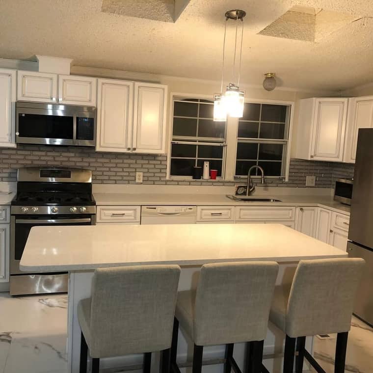Kitchen remodel with island and subway tile backsplash in Corpus Christi