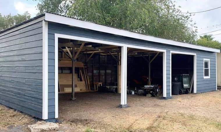 Garage rebuild with new siding and metal roof in Corpus Christi