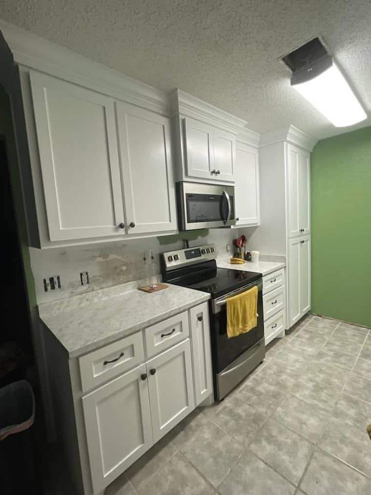 Kitchen remodeling Corpus Christi — white cabinets with marble countertops