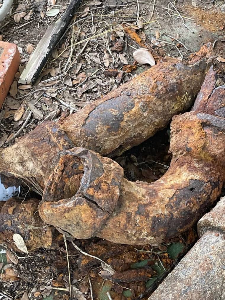 Corroded cast iron sewer pipe removed during plumbing repair in Corpus Christi