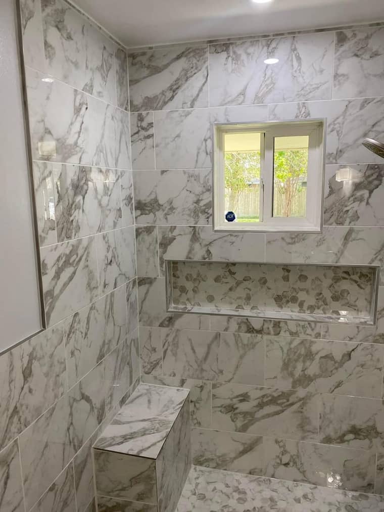 Bathroom renovation Corpus Christi — marble shower with bench
