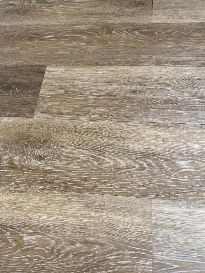 Luxury vinyl plank flooring in oak finish installed in Corpus Christi home